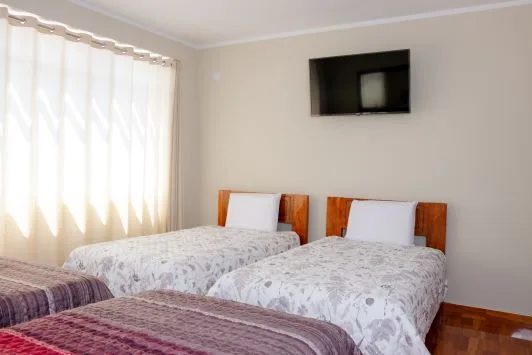 Habitación Cuádruple, vista 2 — Hotel Real Progreso